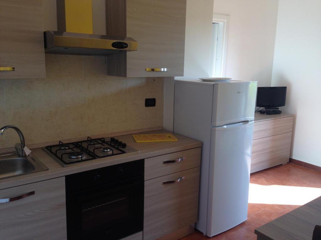 Sardinia Beach Apartments Алиенту Екстериор снимка